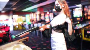 Braless and Pantyless Adventure in the Arcade: A Public Solo Display