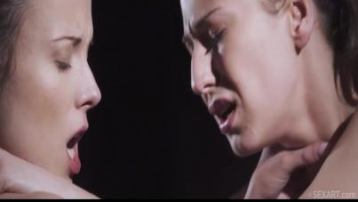 Lingerie-clad brunettes surrender to intense fingering and standing seduction in this steamy lesbian encounter